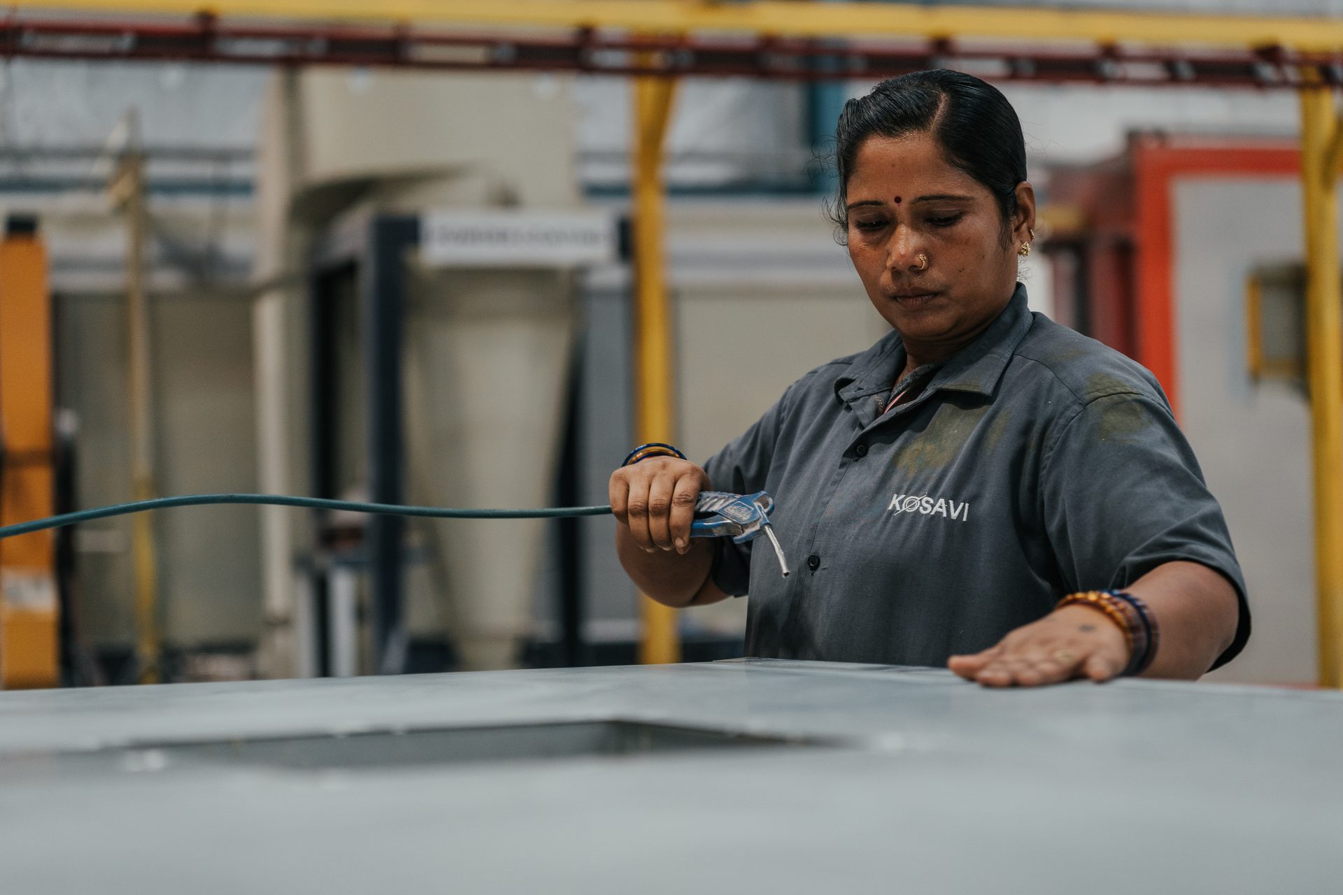 Kosavi factory — door frame assembly area